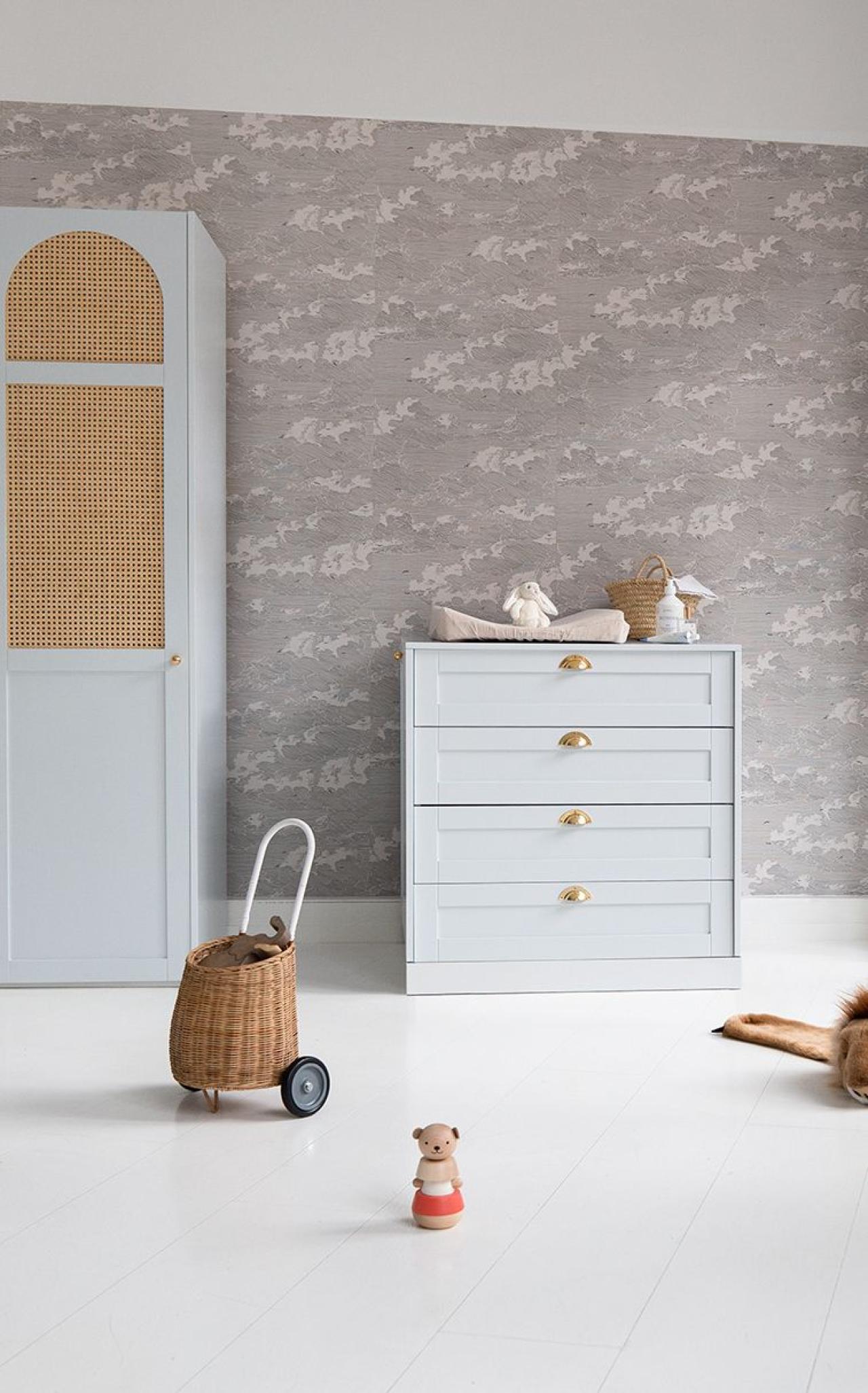 An evolutionary changing table x chest of drawers for kids